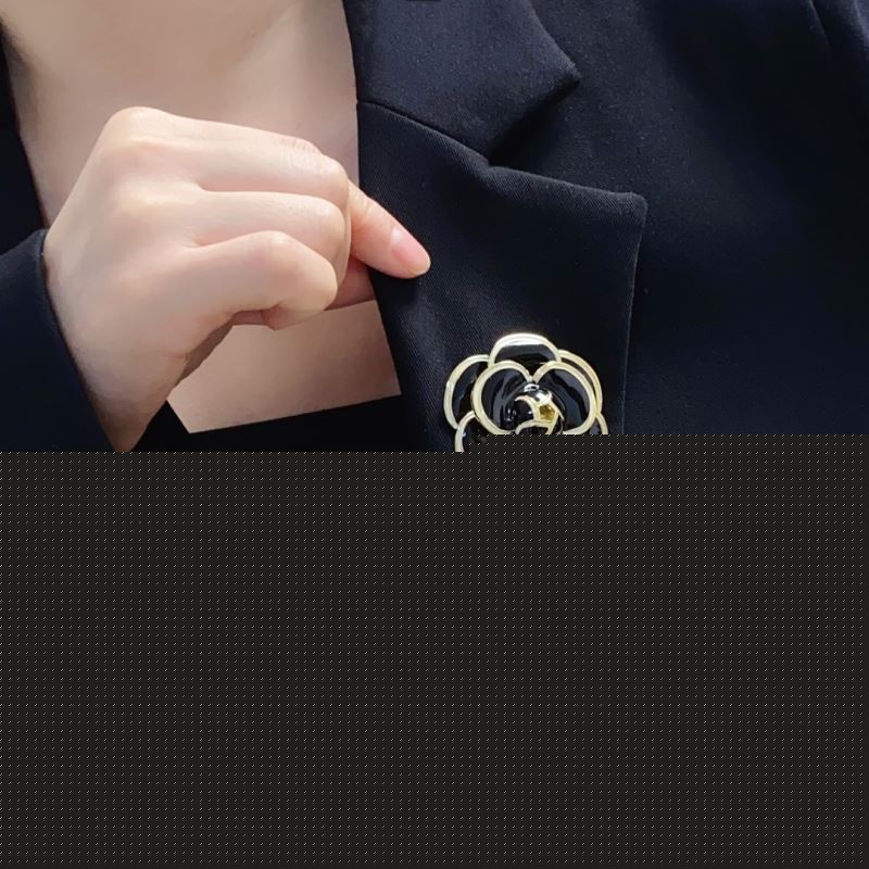 Ch*el brooches